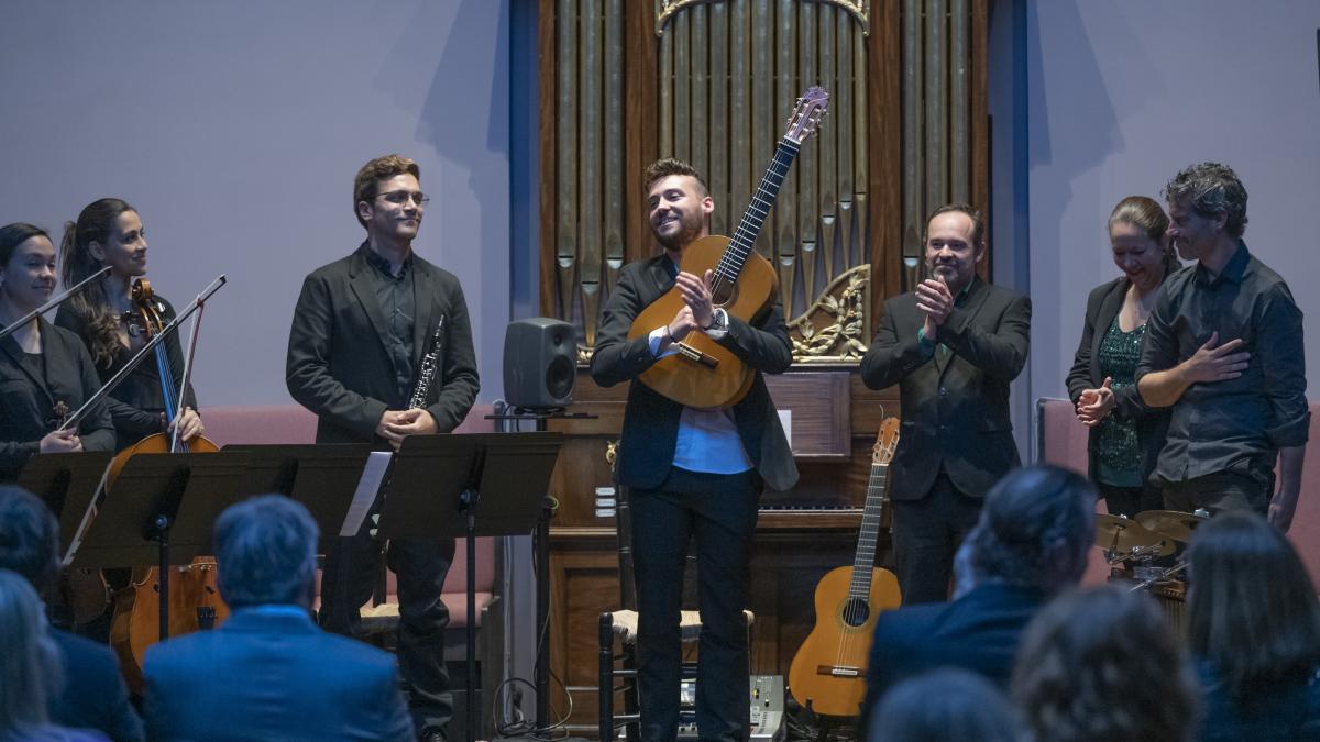 SPanish band on stage with guitars