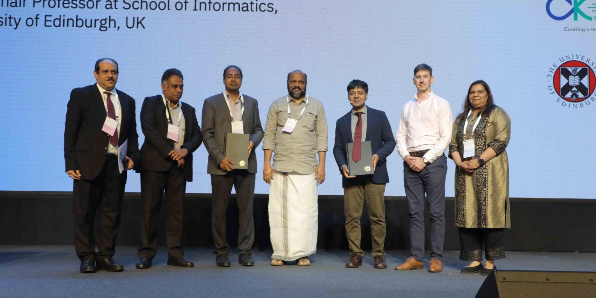 Group photo at the AI and robotics partnership with Kerala keynote