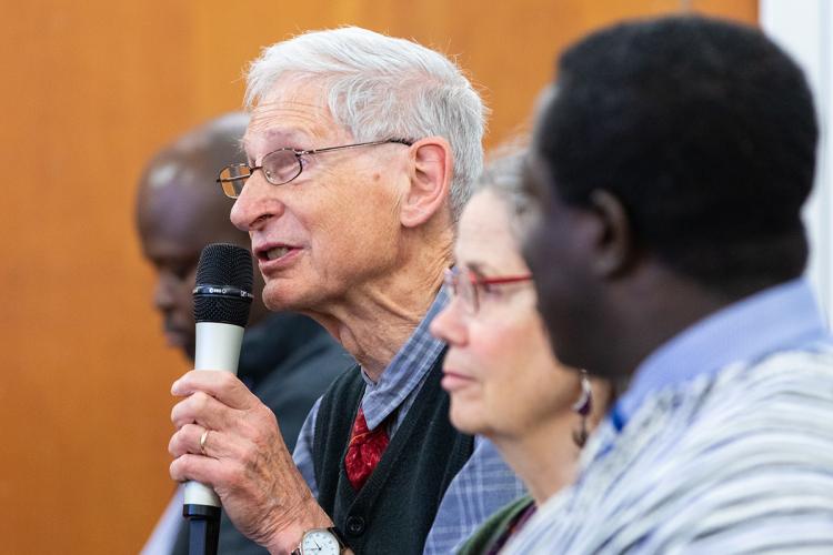 Man speaking into microphone