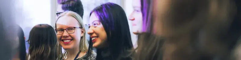 Two students smiling at Student Congress