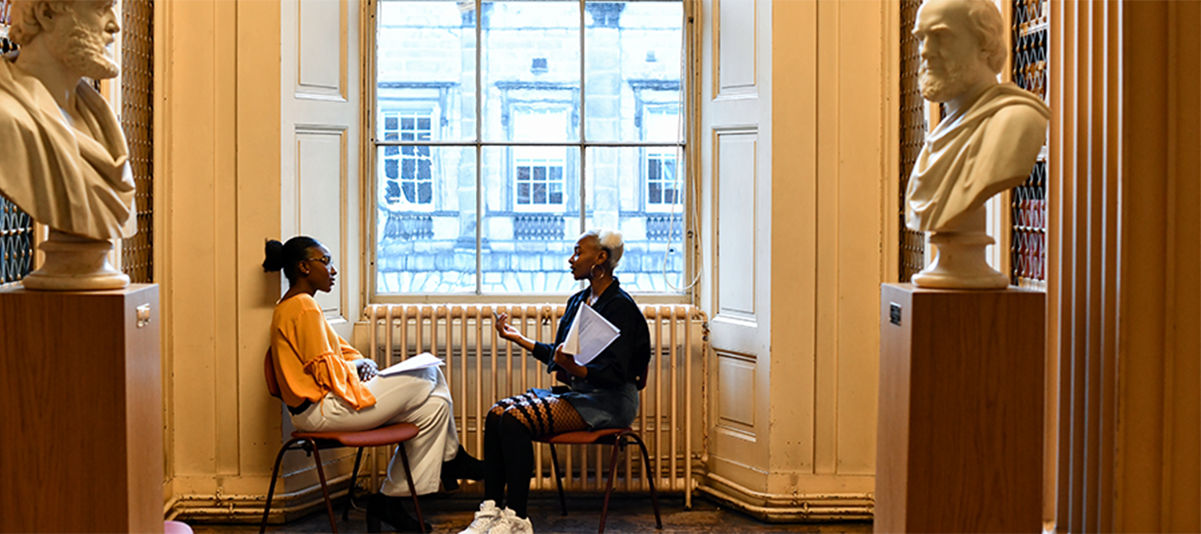 Two African students having a conversation