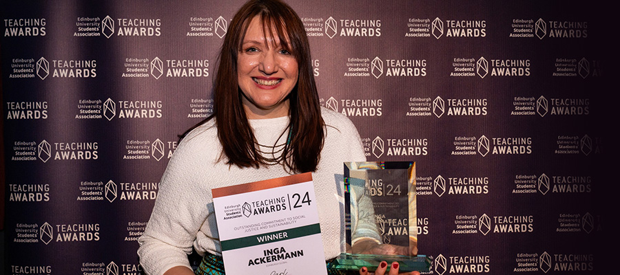 Inga Ackermann holding her EUSA teaching award and certificate