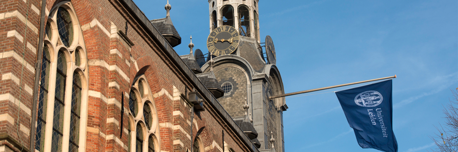 Leiden University building and university flag