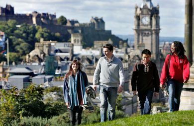 Four Edinburgh students walking up Calton Hill